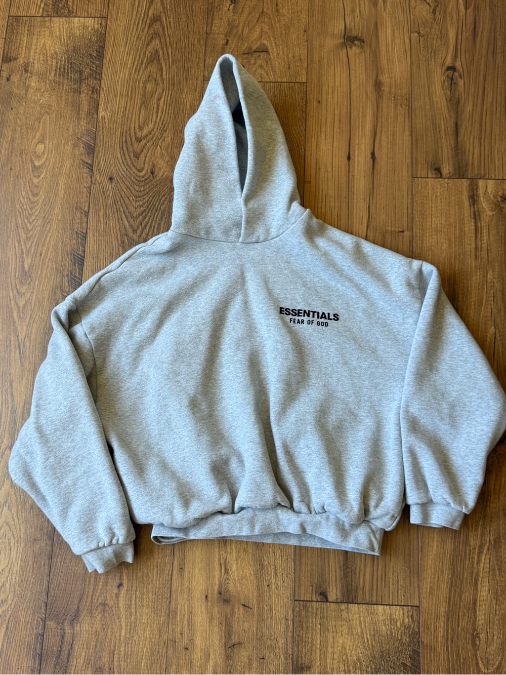 Essentials Grey Pullover Hoodie with Embossed Neck Label
